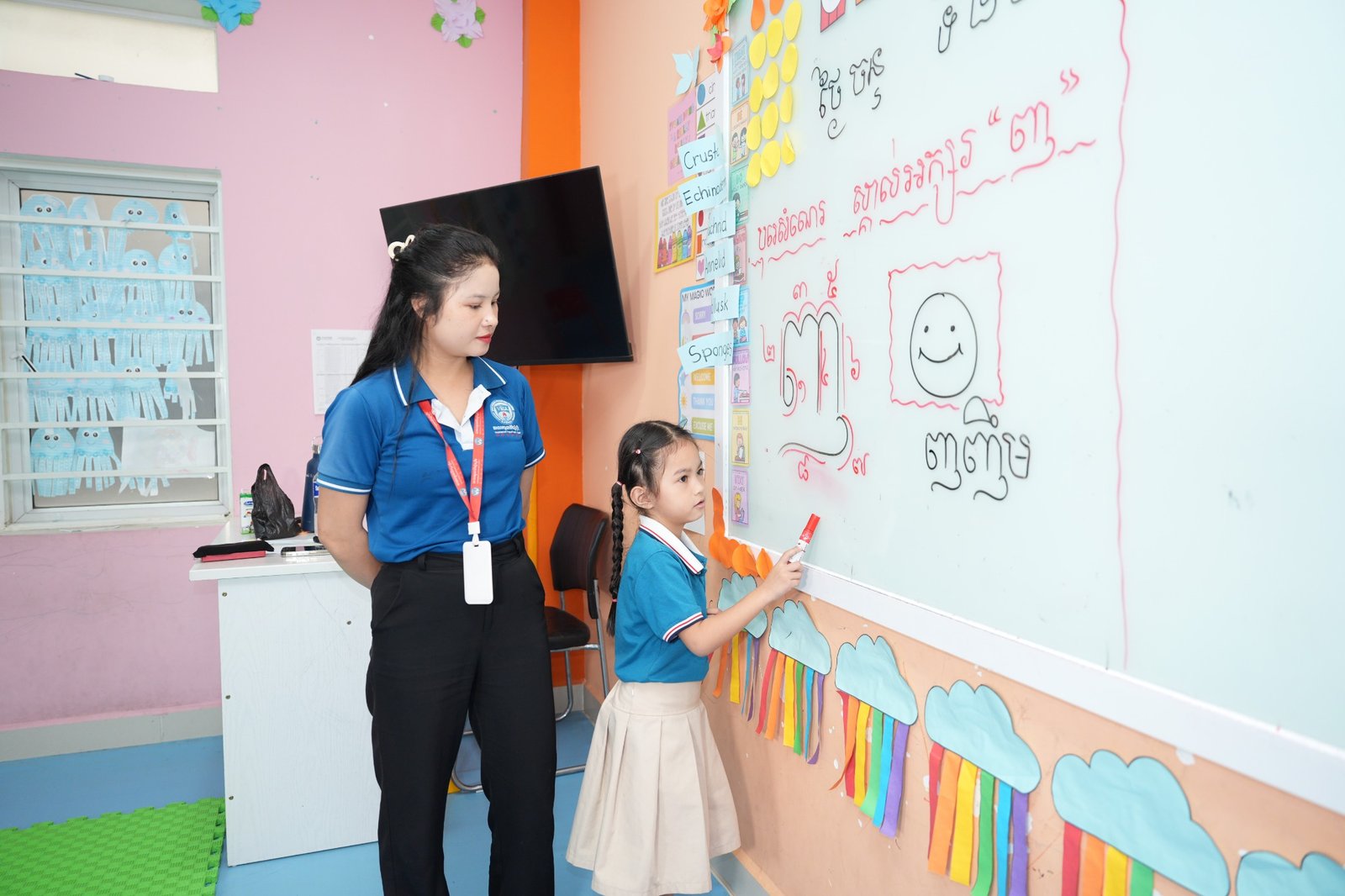 A teacher and children in a VBIA classroom